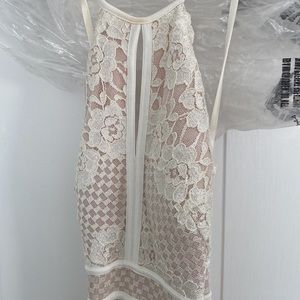 Winter white dress in an extra small long length. Worn once. Beautiful on!